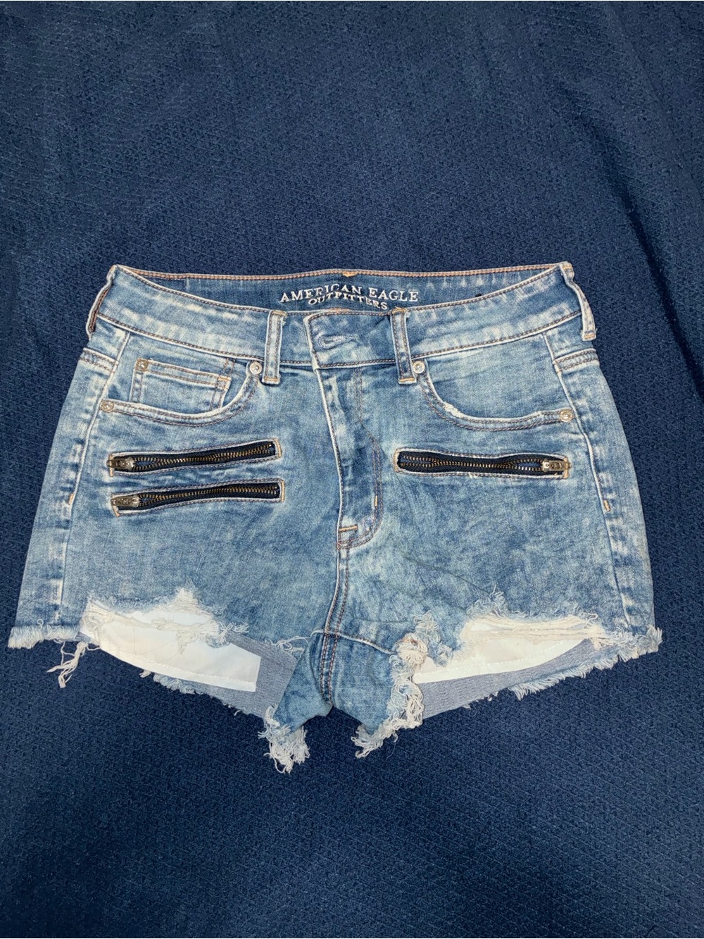 American Eagle Outfitters Light Blue Distressed Denim Shorts with Zipper Accents